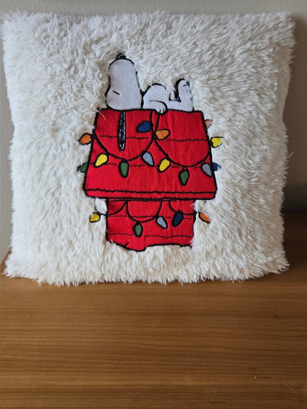 Peanuts White Faux Fur Pillow with Red Snoopy Doghouse and Multicolor Lights